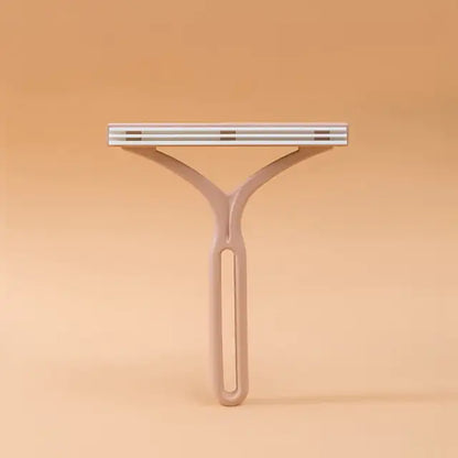 Brosse pour enlever les poils d'animaux